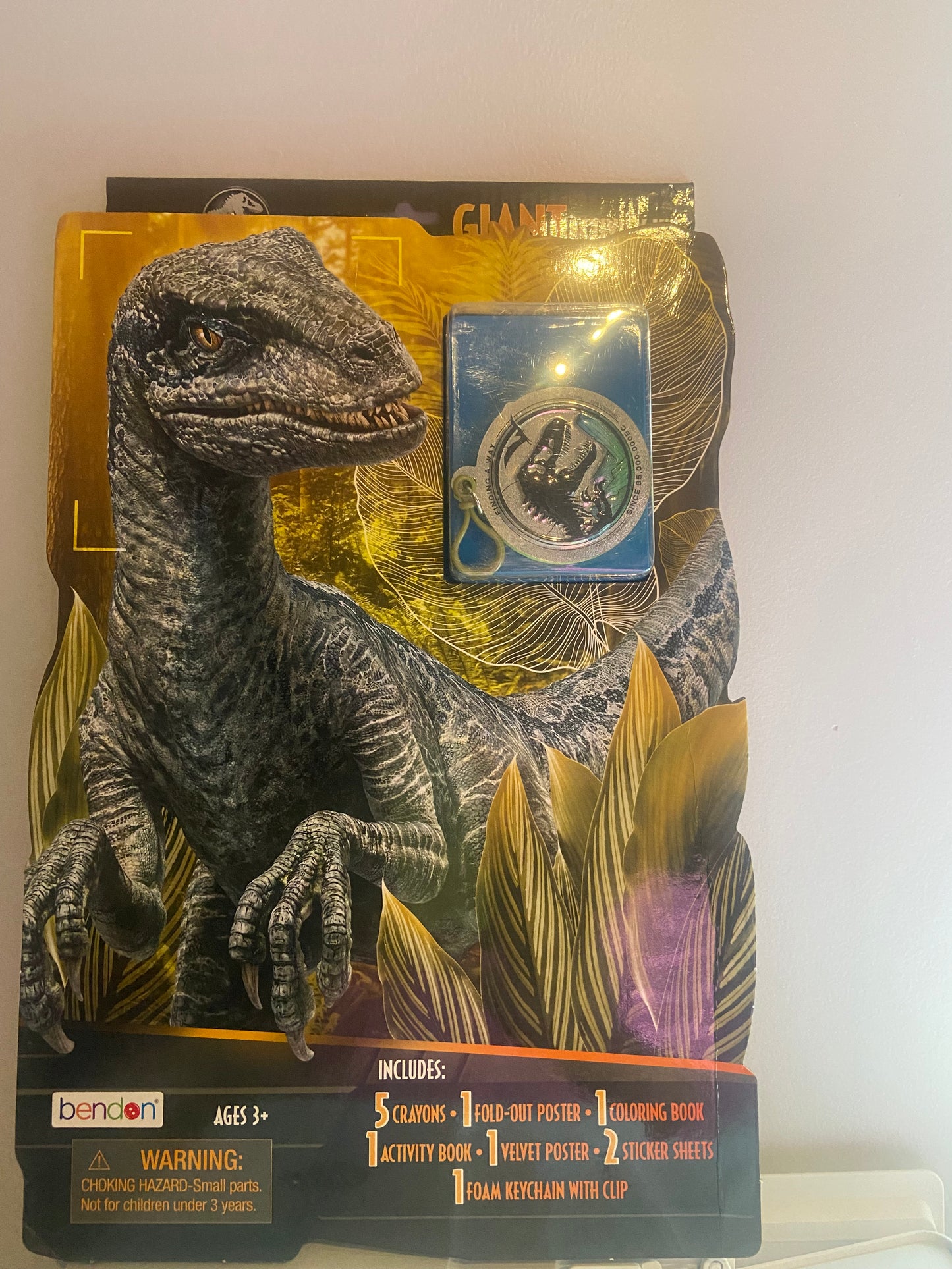 Jurassic World Giant Activity kit includes: 5 crayons, 1 Foldout poster, 1 coloring book, 1 activity book, 1 velvet poster, 2 sticker sheets, 1 foam keychain with clip